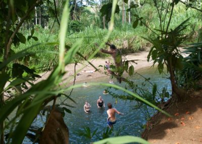volunteer programs costa rica rainforest limon group swimming bananito river