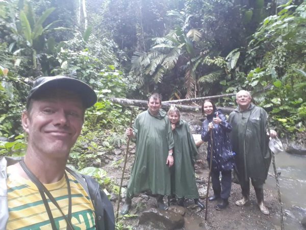 rainforest-costa-rica-tours-limon-jungle-guide-handling-bananito-monkey-panorama-dutch-biologist-hike